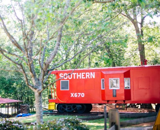 NORFOLK SOUTHERN CABOOSE Donated by Norfolk-South Railways in 1989, this is currently the office of the Middle Years principal. When it  arrived on campus, it was renovated to become the location for the first High Meadows School
library.