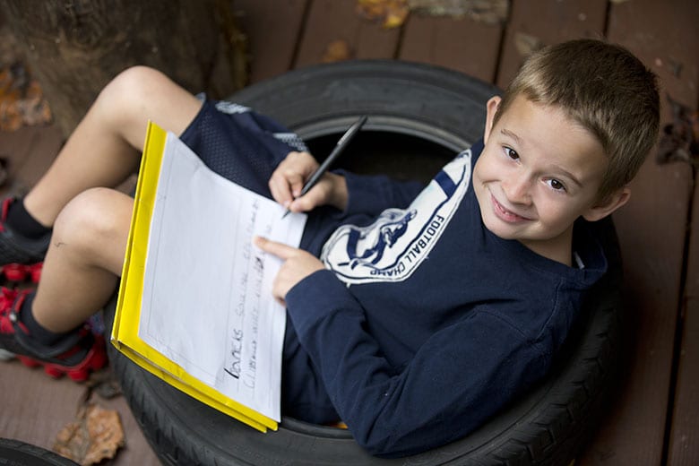 Handwriting and happy kid at top Atlanta Private school